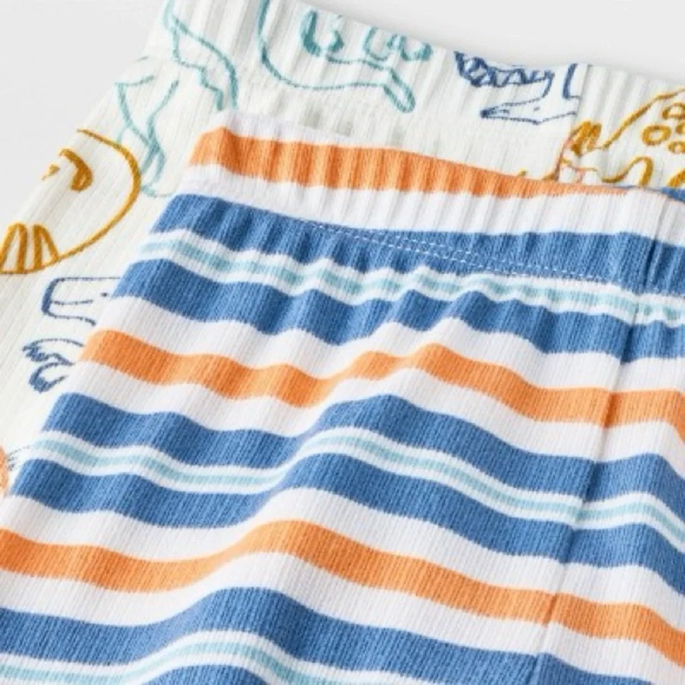 Toddler Boys' 4pc Dinos and Striped Ribbed Pajama Set